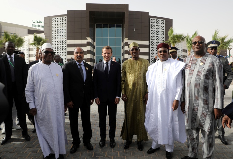 French President Emmanuel Macron poses with leaders at an African Union summit in Nouakchott