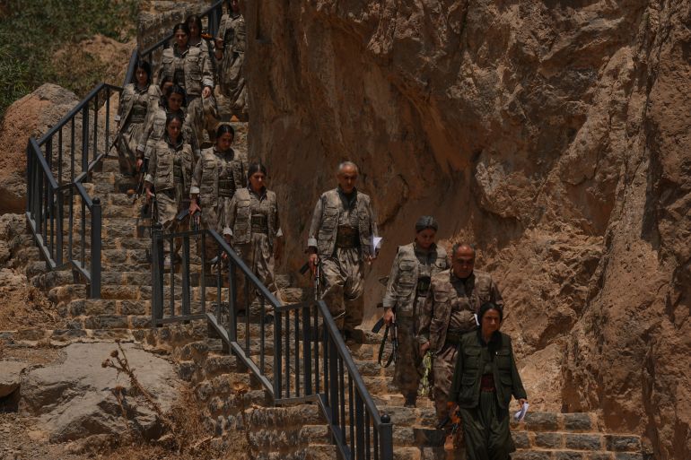 SULAYMANIYAH, IRAQ - JULY 11: The first group of PKK terrorists, (listed as a terrorist organization by Turkiye, the U.S. and the EU), lays down and destroys their weapons in Sulaymaniyah, northern Iraq on July 11, 2025. In May, the terror group PKK, decided to dissolve and lay down its arms. The announcement followed a February statement by jailed PKK ringleader Abdullah Ocalan, who called for the dissolution of the PKK and its affiliated groups, urging an end to the armed campaign that has lasted more than four decades. In its 40-year terror campaign against Türkiye, the PKK – listed as a terrorist organization by Türkiye, the US, and EU – has been responsible for the deaths of over 40,000 people, including women, children, infants and the elderly. ( Stringer - Anadolu Agency )