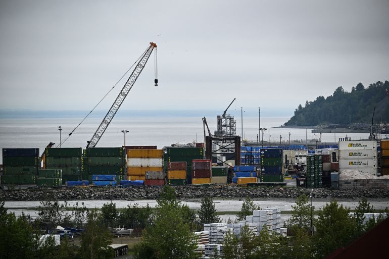 Shipping containers are seen near the Port of Anchorage in Anchorage, Alaska on August 14, 2025, ahead of the August 15 scheduled meeting between US President Donald Trump and Russian President Vladimir Putin. Trump on Thursday acknowledged his high-stakes summit with Vladimir Putin may fail, and said any Ukraine deal would come through a future three-way meeting with Kyiv to "divvy things up." Russian President Vladimir Putin flies to Alaska on Friday at the invitation of Trump in his first visit to a Western country since he ordered the 2022 invasion of Ukraine that has killed tens of thousands of people. (Photo by Drew ANGERER / AFP)
